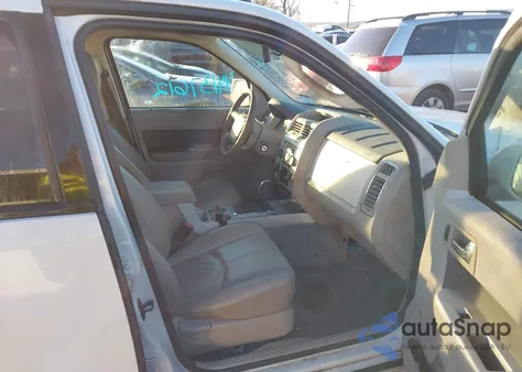 2009 Mercury Mariner Premier from USA, damaged, VIN 4M2CU87709KJ01313